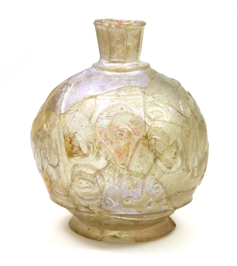 Appraisal: A wheel-cut clear glass bottle Iran th or th century