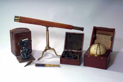 Appraisal: A French brass three draw telescope with a leather grip