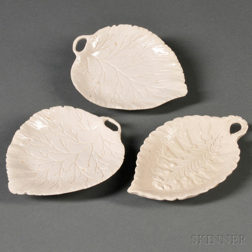 Appraisal: Three Staffordshire Salt-glazed Stoneware Leaf-shaped Dishes England c a pair