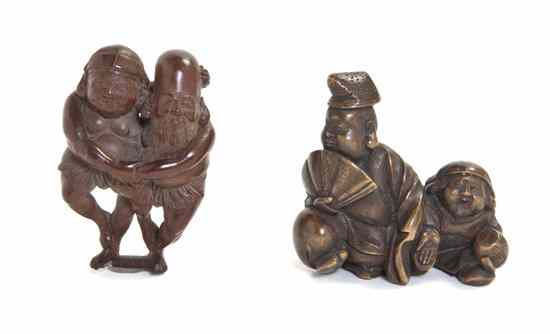 Appraisal: A Group of Two Carved Wood Netsuke each a pair