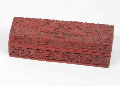 Appraisal: A Chinese cinnabar red lacquer rectangular box and cover decorated