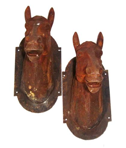 Appraisal: Pair of large cast-iron horse heads th century