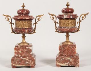 Appraisal: PAIR OF FRENCH ROUGE MARBLE COUPS WITH GILT BRONZE CONTINUOUS