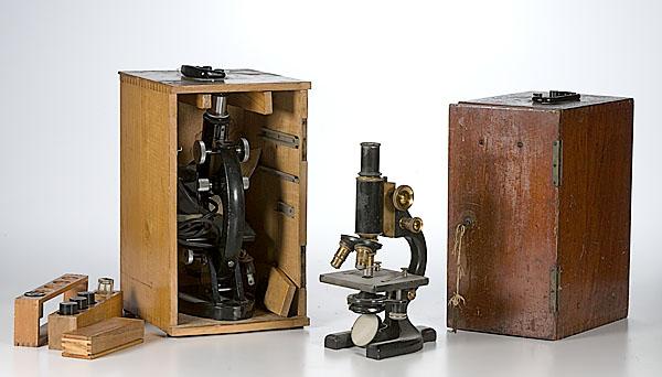 Appraisal: TWO THREE-OBJECTIVE LENS MICROSCOPES including one brass and cast iron