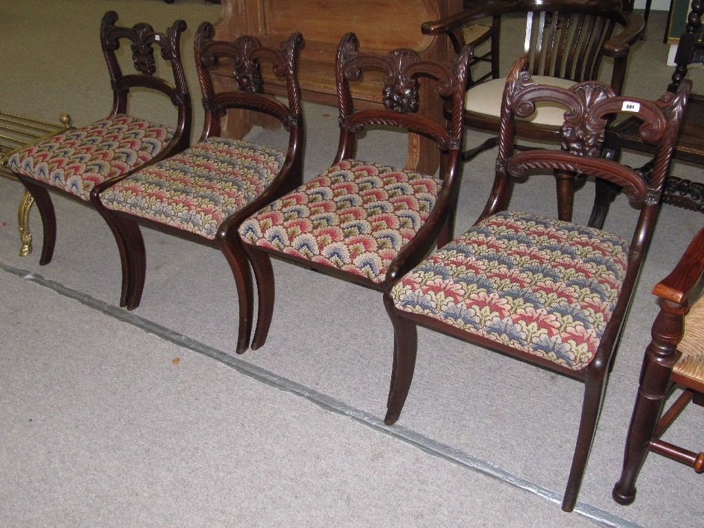 Appraisal: Set of four Regency mahogany dining chairs on sabre legs