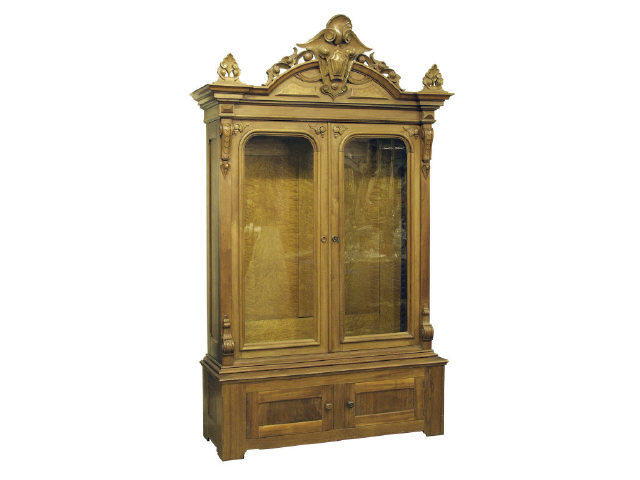 Appraisal: Circa - attractive walnut bookcase -door with superb carved upper