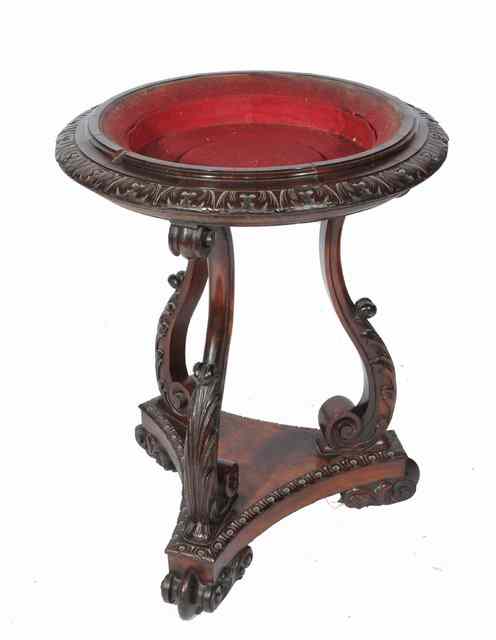 Appraisal: A GEORGE IV ROSEWOOD BASIN STAND the circular red velvet