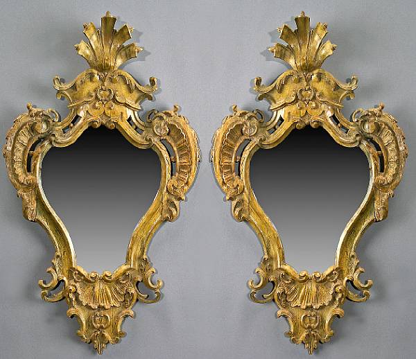 Appraisal: A pair of Italian Baroque style oak mirrors late th