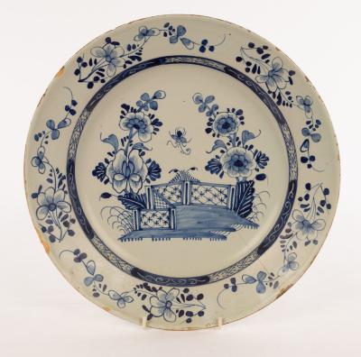 Appraisal: A Delft blue and white charger possibly London depicting a