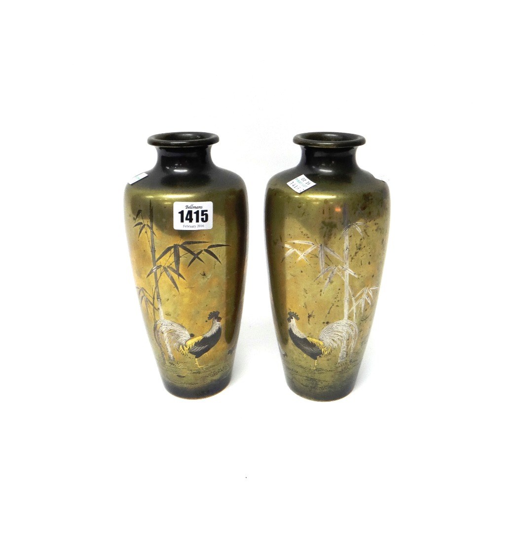 Appraisal: A pair of Japanese bronze vases Meiji period of slender