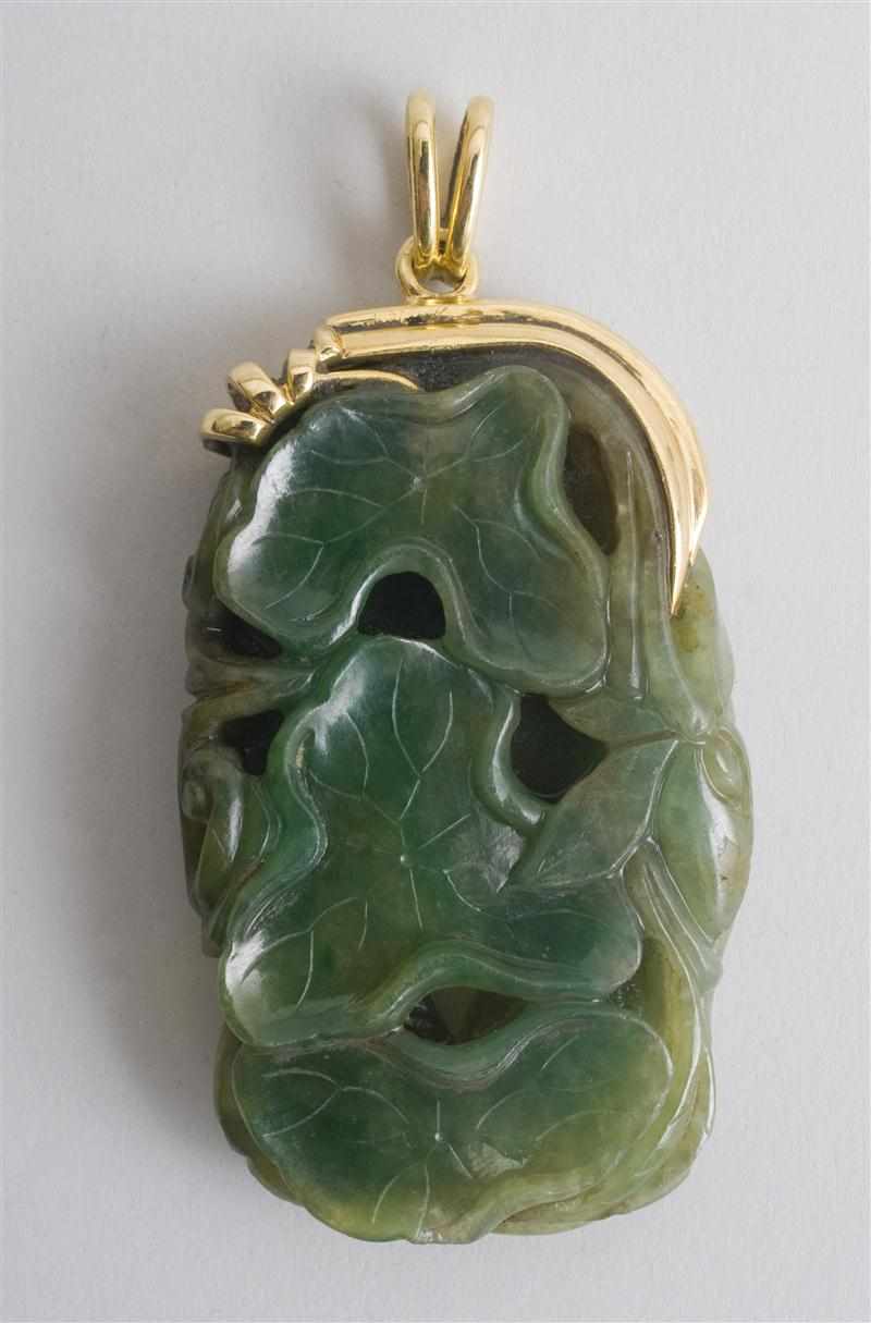 Appraisal: FINE CARVED JADE PENDANT FITTED WITH SIGNED CARTIER K GOLD