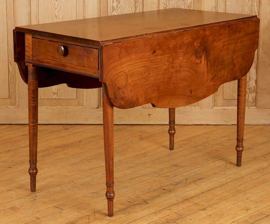 Appraisal: TH C AMERICAN WALNUT DROP LEAF TABLE An eighteenth century