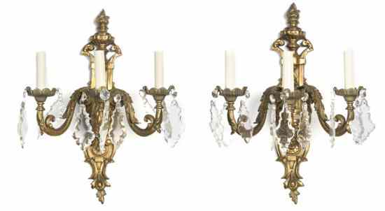 Appraisal: A Pair of Gilt Bronze Three-Light Sconces the backplate having