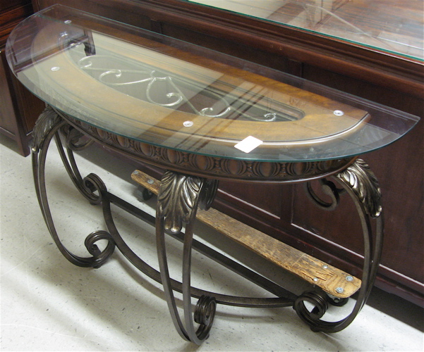 Appraisal: GLASS-TOP MAHOGANY AND WROUGHT IRON CONSOLE TABLE recent manufacture The