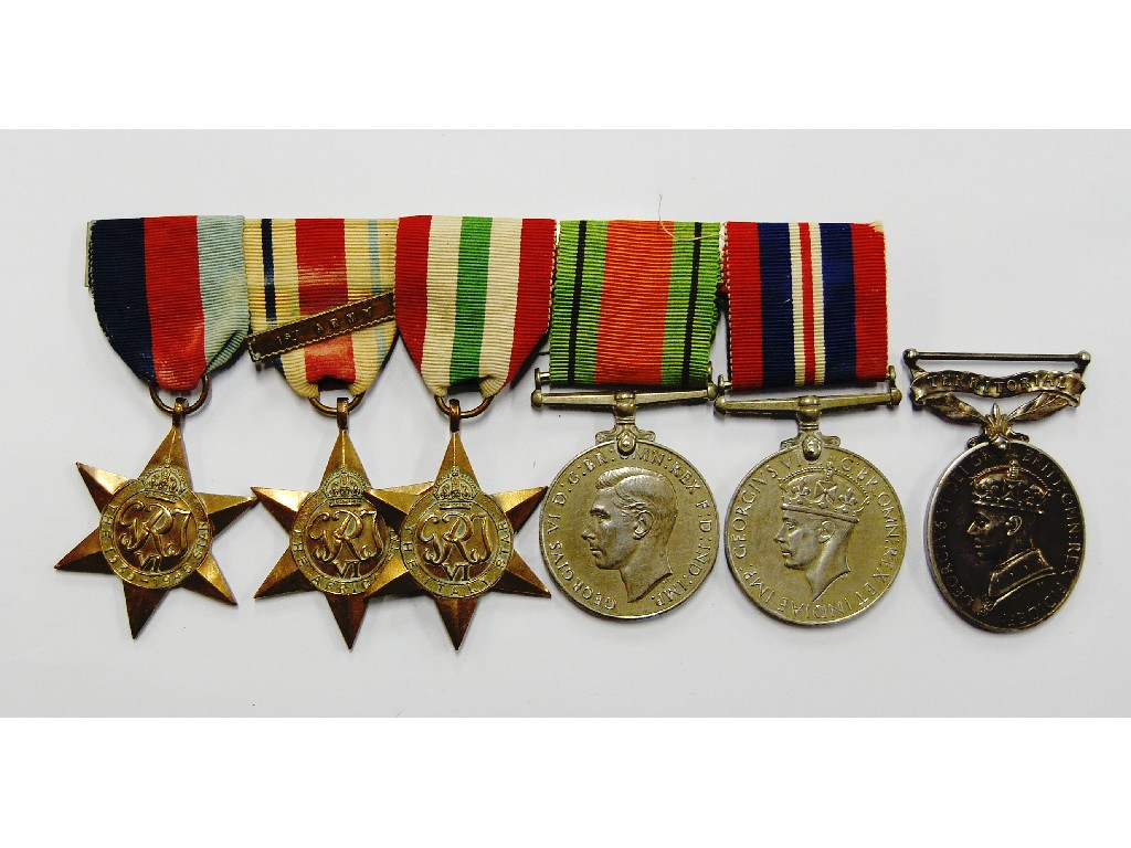 Appraisal: A WWII medal group of six to Gnr E J