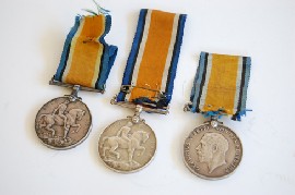 Appraisal: THREE WWI MEDALS AWARDED TO GNR TOMBS PTE GULLIVER AND