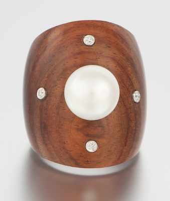 Appraisal: A Carved Mahogany Pearl and Diamond Ring Carved mahogany ring