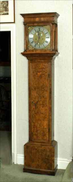 Appraisal: AN TH CENTURY WALNUT LONGCASE CLOCK the hood with moulded