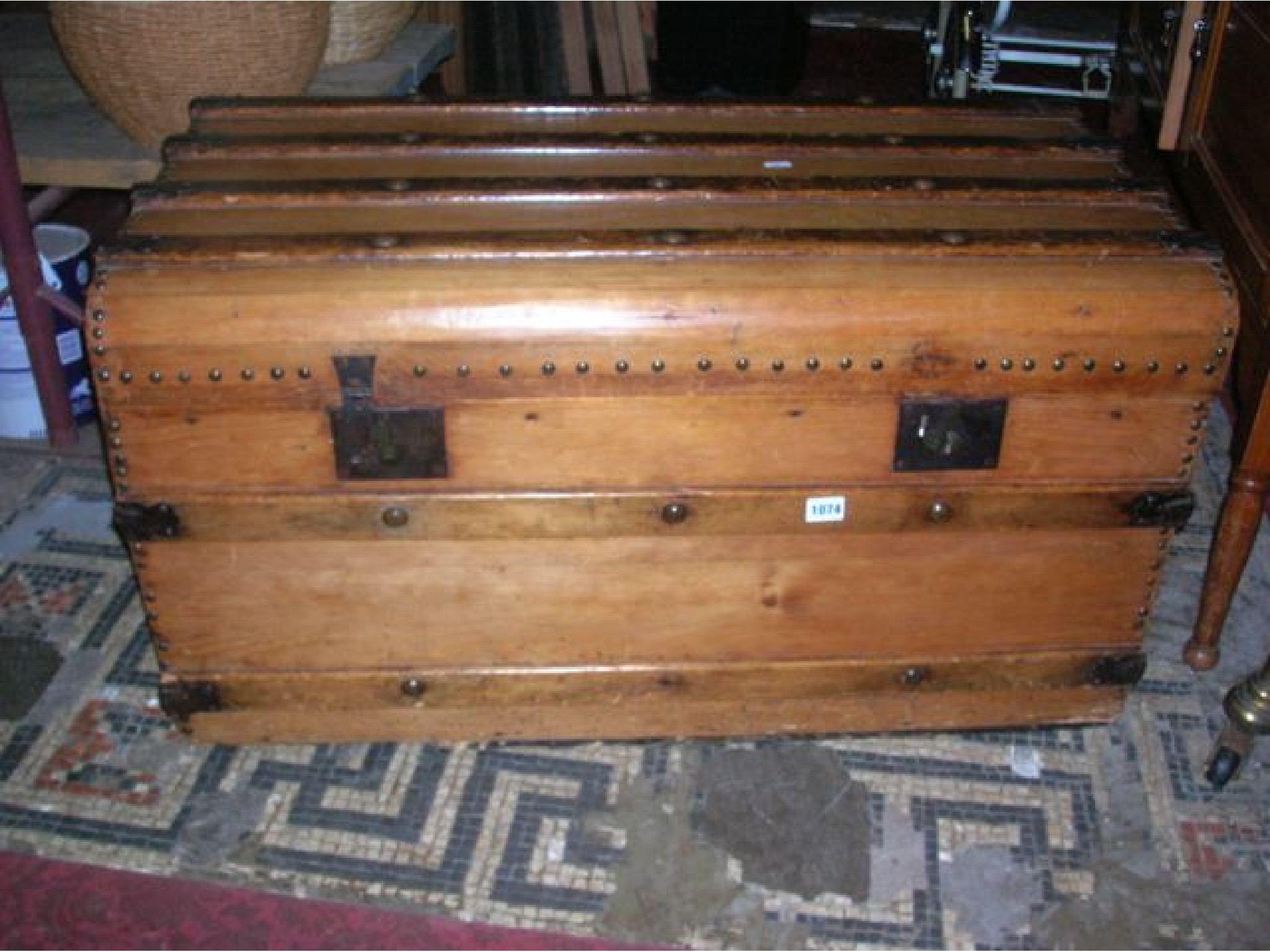 Appraisal: A th century stripped and waxed pine domed top travelling