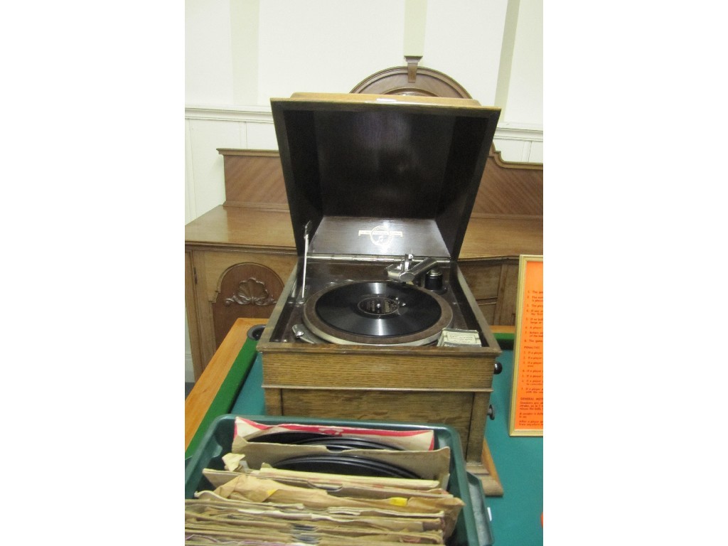 Appraisal: Columbia oak cased gramaphone with vinyl records