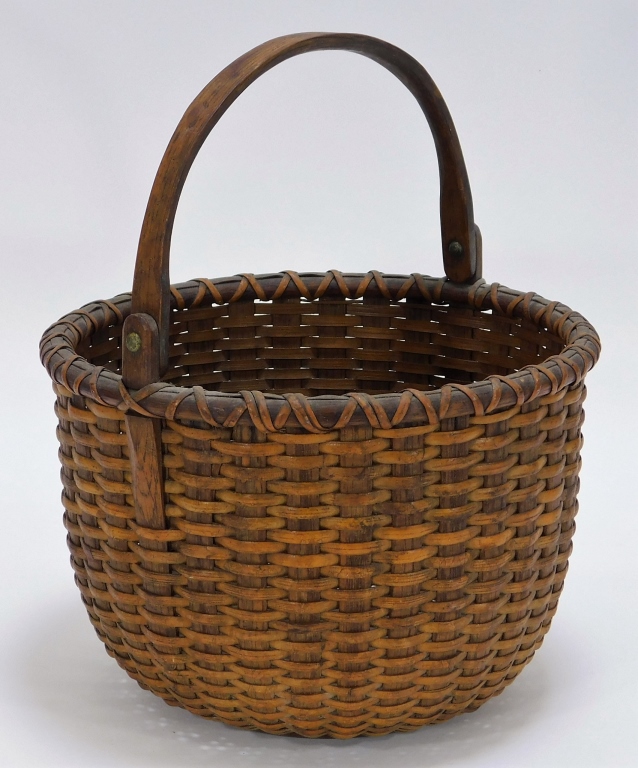 Appraisal: HAND WOVEN NANTUCKET BASKET WITH SWING HANDLE Massachusetts Circa Tightly