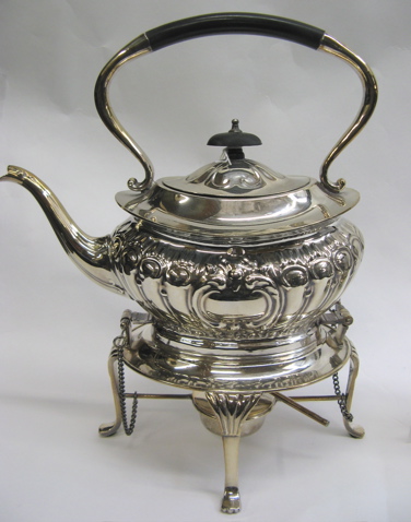 Appraisal: ENGLISH SHEFFIELD SILVER PLATED TEAPOT on stand The teapot removes