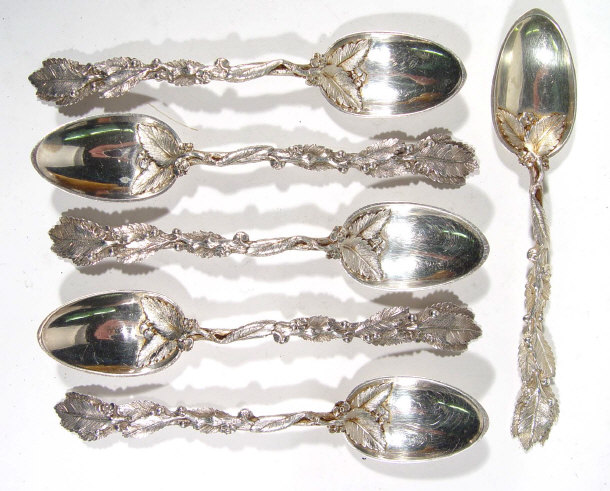 Appraisal: Set of six Victorian silver teaspoons with naturalistic blossoming grapevine