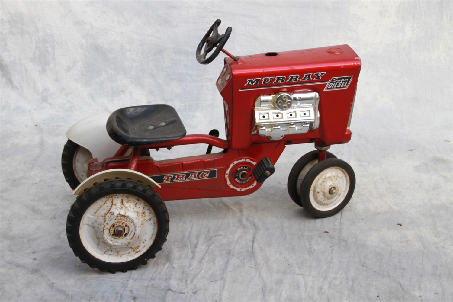 Appraisal: Murray Super Diesel ball bearing track pedal tractor red surface