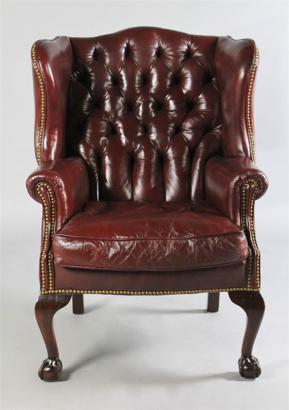 Appraisal: GEORGE II STYLE CORDOVAN TUFTED LEATHER WING CHAIR WITH NAIL