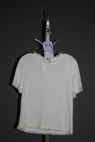 Appraisal: Oscar de la Renta off-white short sleeve knit top with