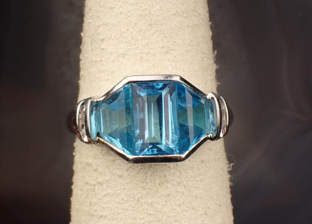 Appraisal: BLUE TOPAZ DIAMOND AND FOURTEEN KARAT GOLD RING The white