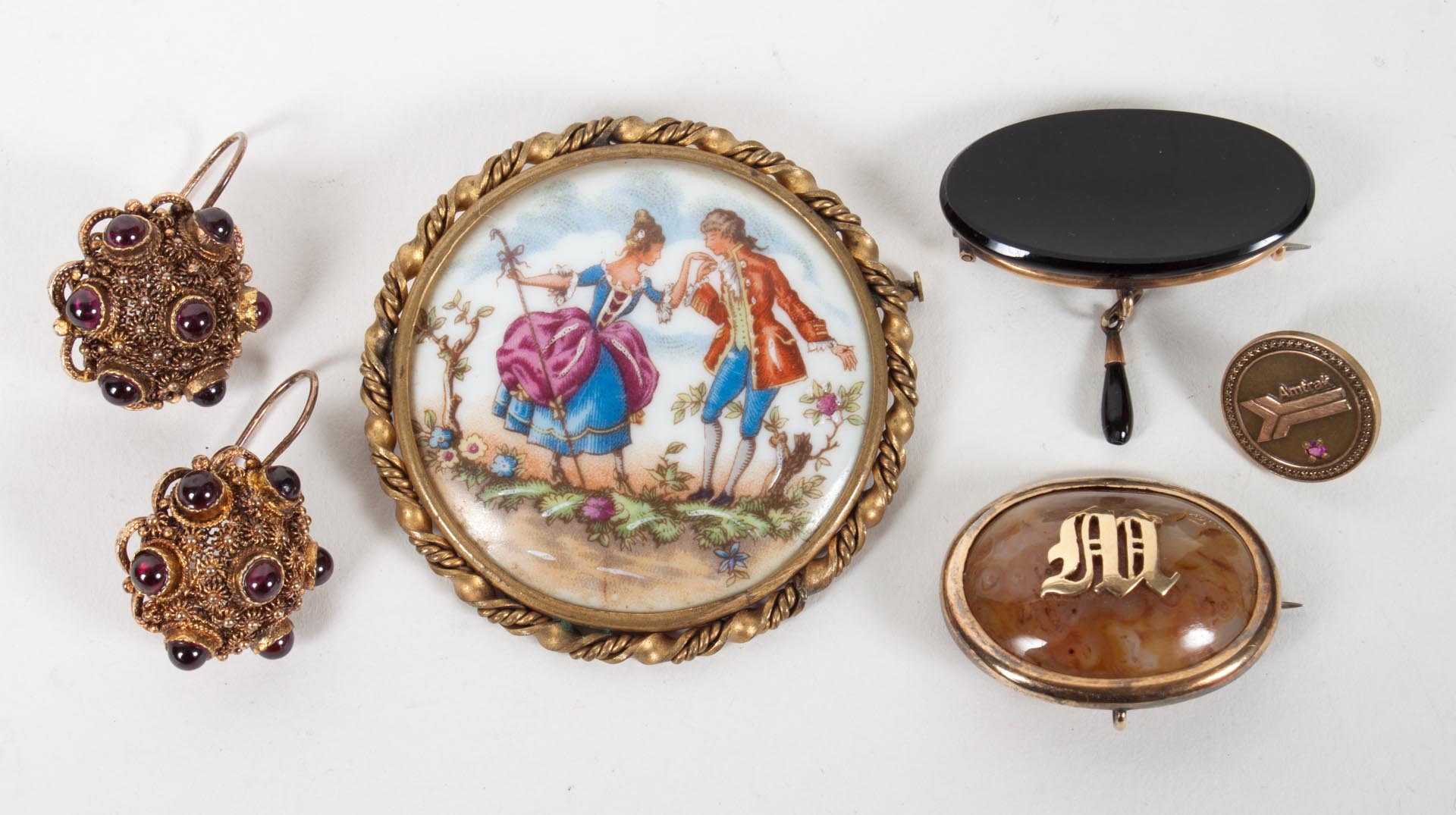 Appraisal: Three brooches and a pair of earrings Limoges round porcelain