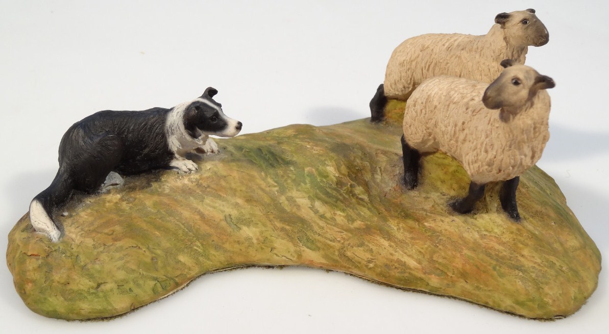 Appraisal: A Border Fine Arts figure group of a sheep dog