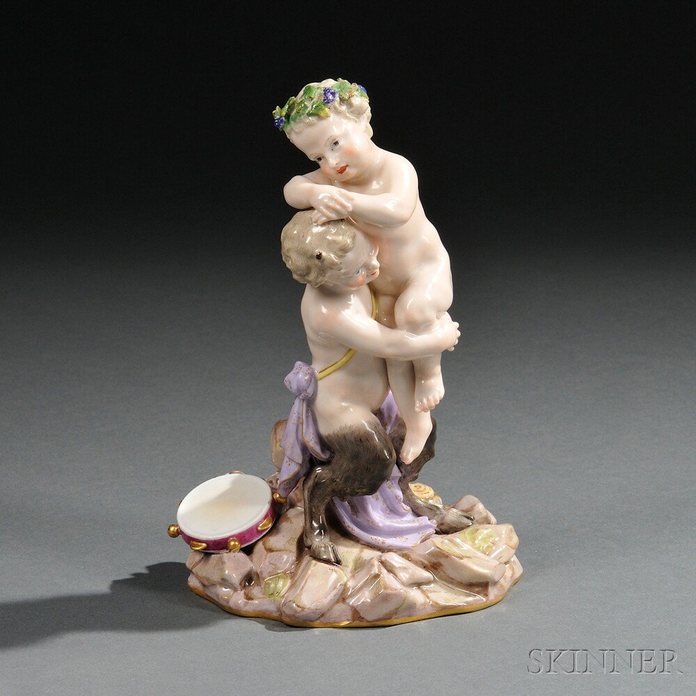 Appraisal: Meissen Porcelain Figure Group of a Putto and Infant Satyr