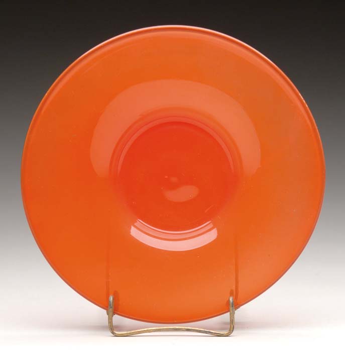 Appraisal: ART GLASS PLATE Small orange red underplate with ground pontil