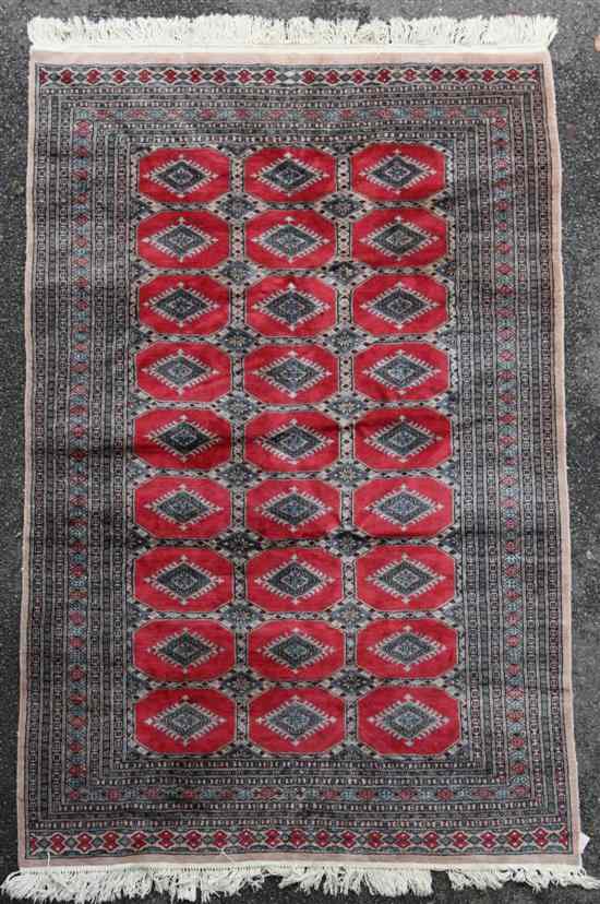 Appraisal: A Pakistani Bokhara design rug with field of twenty seven