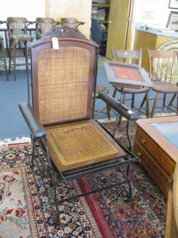 Appraisal: Victorian Chaise Lounge Chair cane woodand metal with interesting swing-out