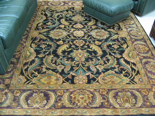 Appraisal: HAND KNOTTED ORIENTAL CARPET Indo-Persian overall scrolling floral raceme decoration