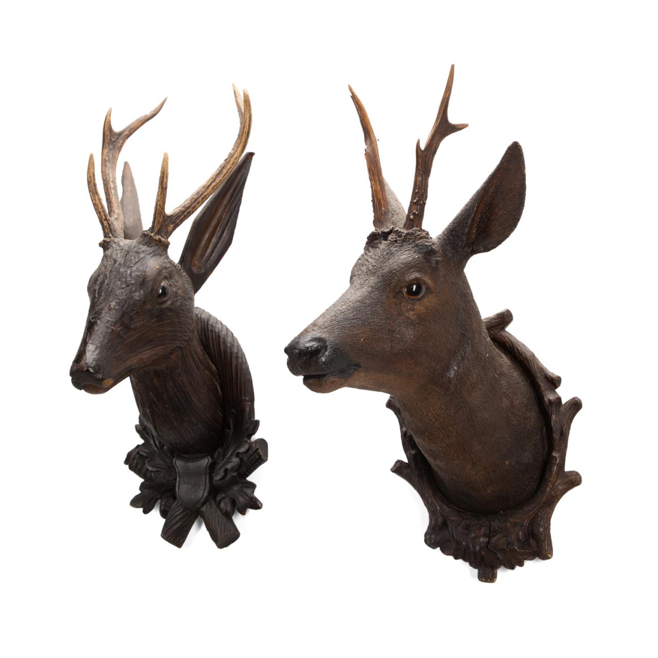 Appraisal: TWO CARVED BLACK FOREST WOODEN DEER HEAD TROPHIES Group of