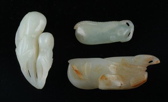 Appraisal: THREE CHINESE CELADON PENDANTS th century Carved to depict double