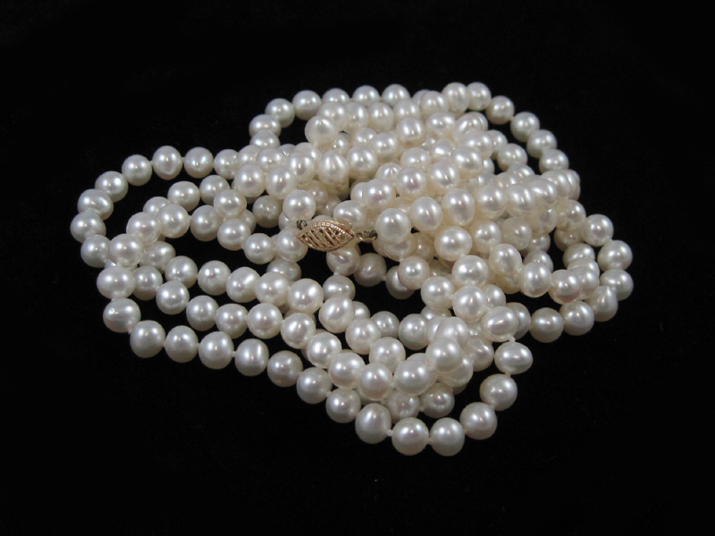 Appraisal: ROPE LENGTH WHITE PEARL NECKLACE measuring approximately inches in length