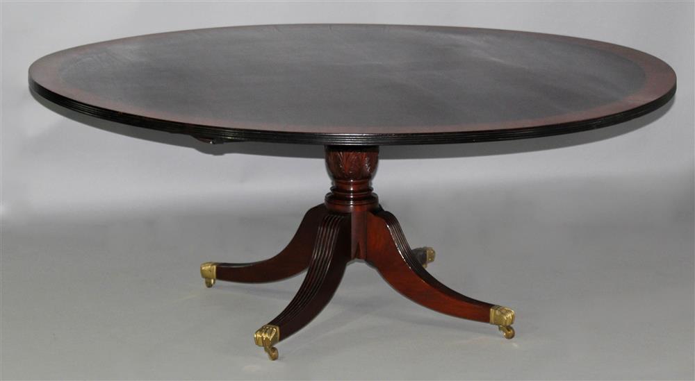 Appraisal: WOOD AND HOGAN CIRCULAR MAHOGANY DINING TABLE top with ebony