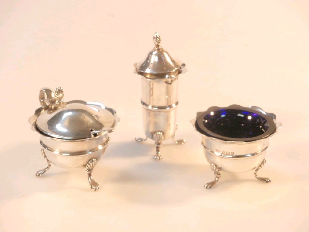 Appraisal: An Edward VII silver three-piece cruet set of circular annulated