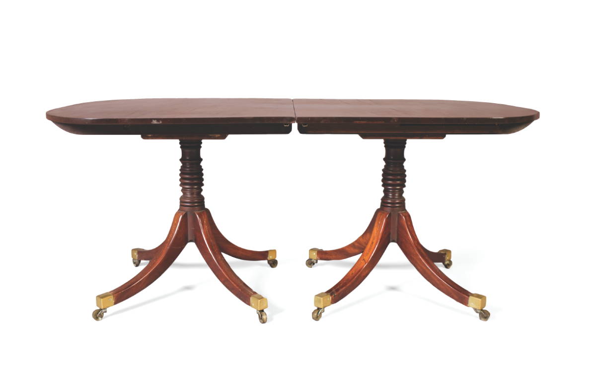 Appraisal: REGENCY TWO-PEDESTAL DINING TABLE Each section with rounded ends and