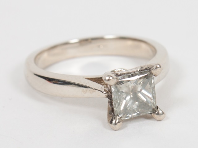 Appraisal: Lady's K and diamond engagement ring presenting a square-cut stone