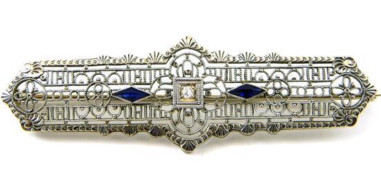 Appraisal: JEWELRY Diamond and synthetic sapphire filigree bar pin stamped and