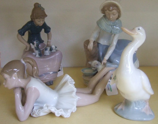 Appraisal: A group of four NAO figures to include ballerina duck