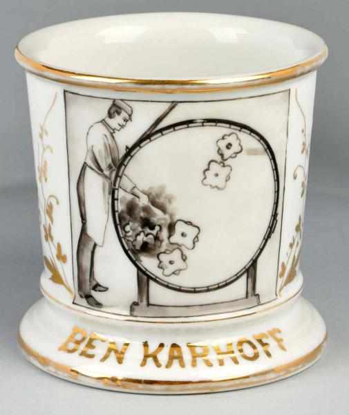 Appraisal: Man Operating a Tumbler Machine Shaving Mug Description Gilt name