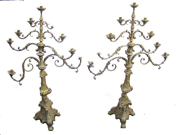 Appraisal: A pair of Baroque style cast brass nine light altar