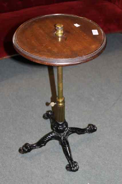 Appraisal: A VICTORIAN CAST IRON AND BRASS OCCASIONAL TABLE with circular